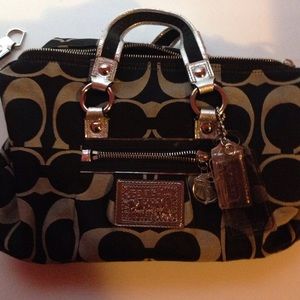 Black and gray coach purse