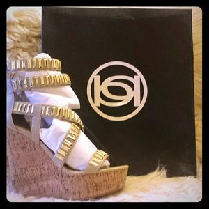 Bebe Tan and gold wedges