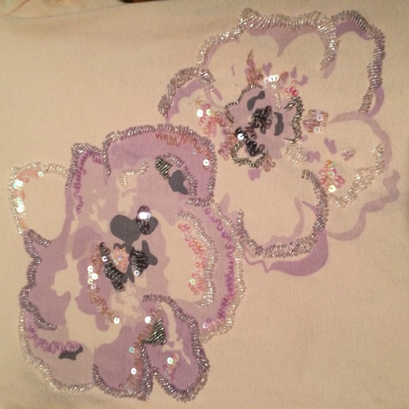 Pink sequined shirt.