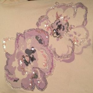 Pink sequined shirt.