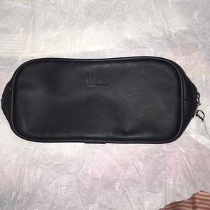 Black Dior cosmetics bag