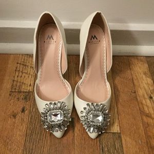 White Madison heels with a jewel on the front