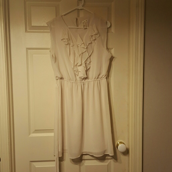 Women's cream colored dress.