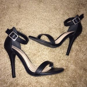 Black strappy heels.