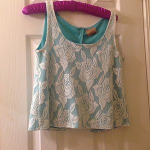 A turquoise blouse perfect for summer!