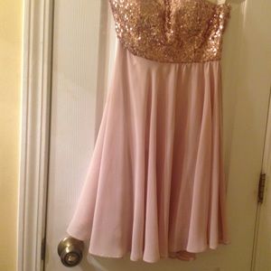 A gorgeous tan and gold semi formal gown!