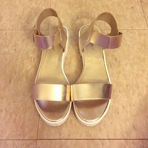 Silver/gold mini clog sandals.