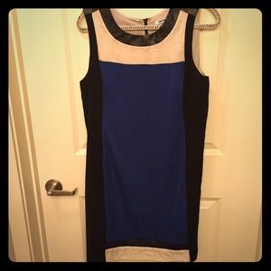 Sleeveless dress with faux leather accents