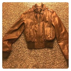 Totally cute ,faux leather, mid waist jacket.