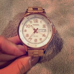 Gold fossil watch