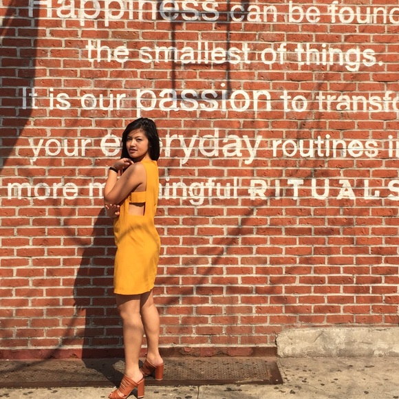 Mustard yellow dress with side cutouts