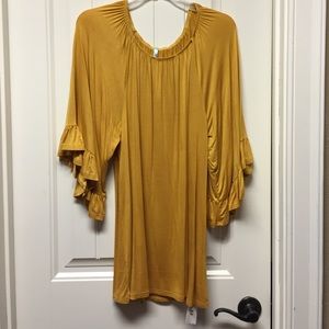 Mustard color top. Brand New!! Size Large