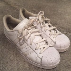 White Adidas Superstars