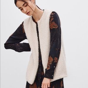 Aritzia cream fur and silk zip up vest