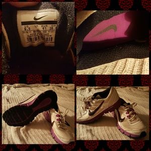 Nike woman's dual fusion 9.5 purple and white