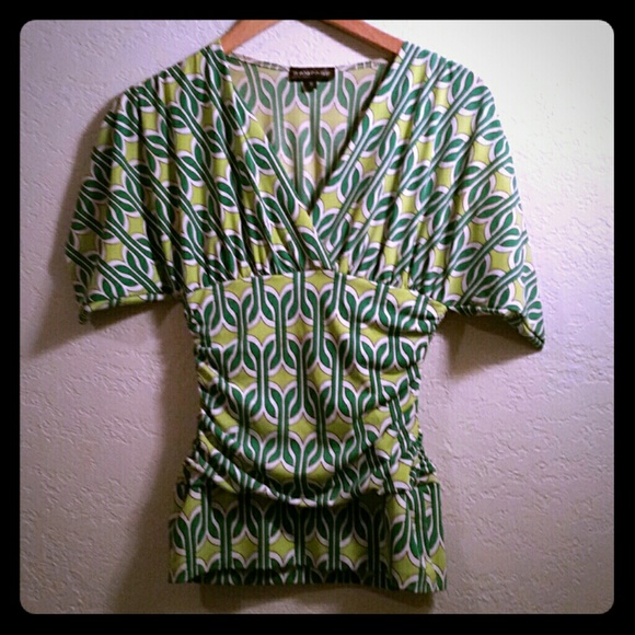Green patterned top.