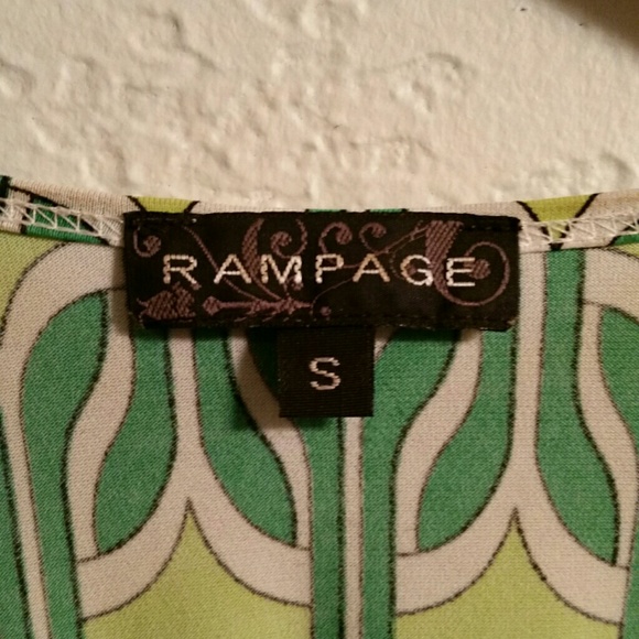 Green patterned top. - Picture 2 of 2