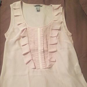 Light pink sleeveless blouse