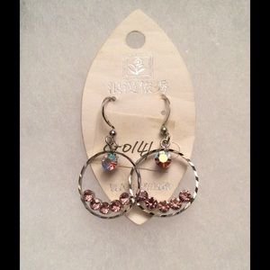 Silver tone earrings with pink stones