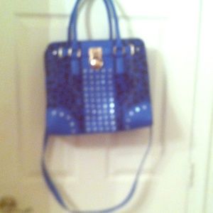 Blue cheetah print studded bag