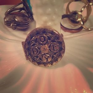 Obey propaganda locket style ring.