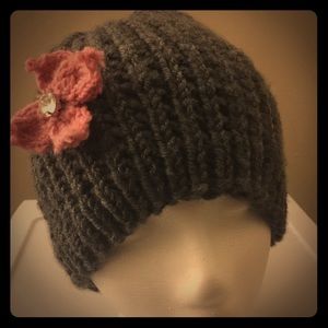 Hand knit gray wool hat with pink flower