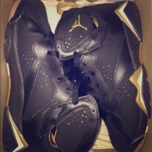 Gold and black retro Jordan's