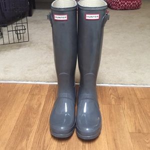 Gray tall glossy hunter boots