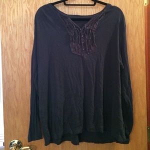 Long sleeve dark grey top.