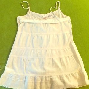Creme colored long tank.
