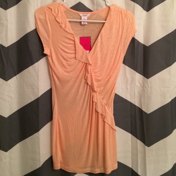 Peach colored shirt