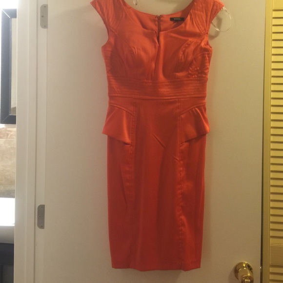 Orange polyester spandex dress.