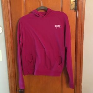 Fuchsia fleece Nike hoodie.