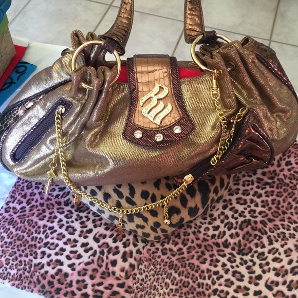 Gold handbag.