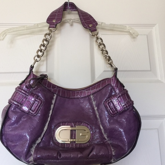 Guess purple handbag.