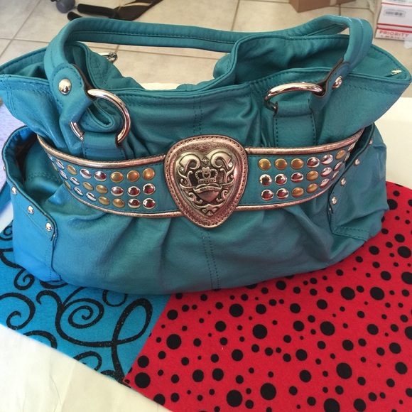 Never used blue handbag.