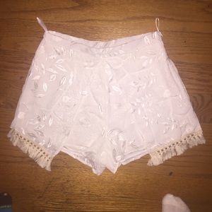 BOHO ivory shorts floral detailing with tassels
