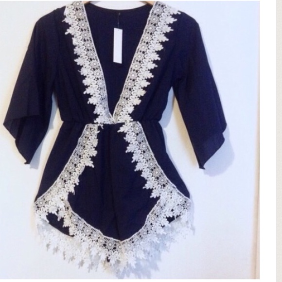 Deep Plunge Navy Romper With White Lace Trim