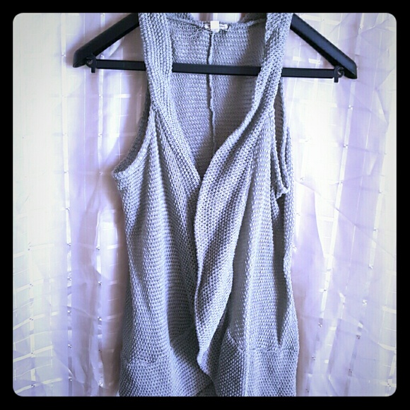 Gray sweater vest.