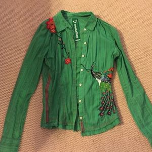 Green button down shirt with stitched details