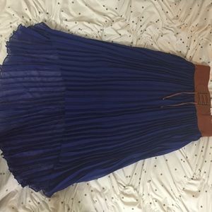 Pleated indigo high-low skirt