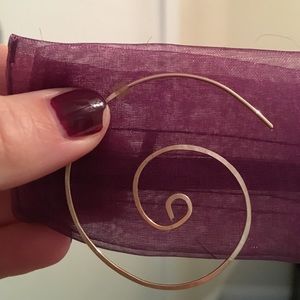 Handcrafted gold hoop earrings