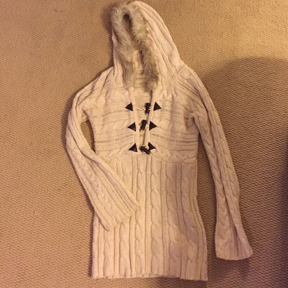 Cream sweater with faux fur on hood