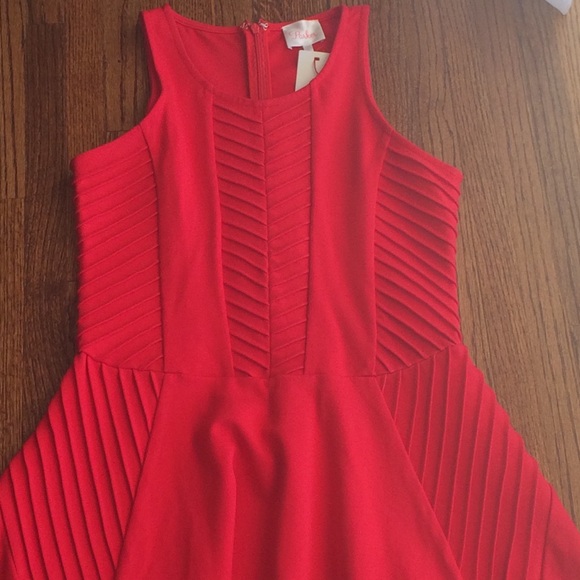 Details galore. Sexy cocktail dress