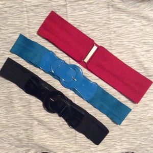 Red, blue and black elastic belts sold "as is".