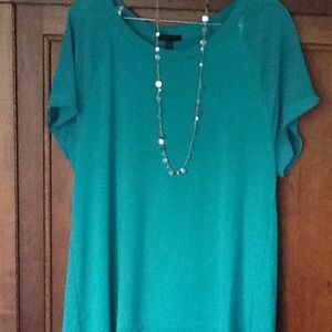 Kelly green top with chiffon-like sleeves ☘