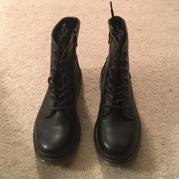 Never Worn combat styled boots.