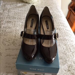Never worn. Dark brown heels. Size 9