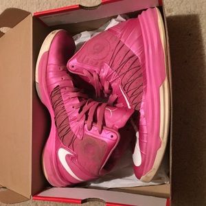 Nike pink basketball shoes, breast cancer symbol