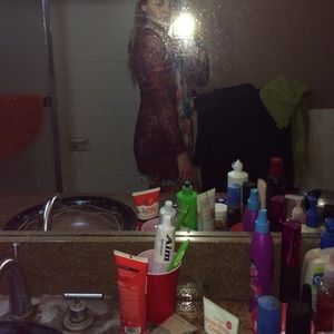 red-maroon colored cardigan